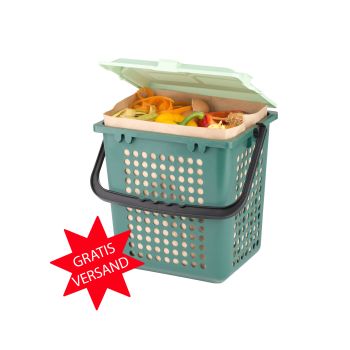 AirBox perforato con sacchetto di carta all'interno e riempito di rifiuti organici